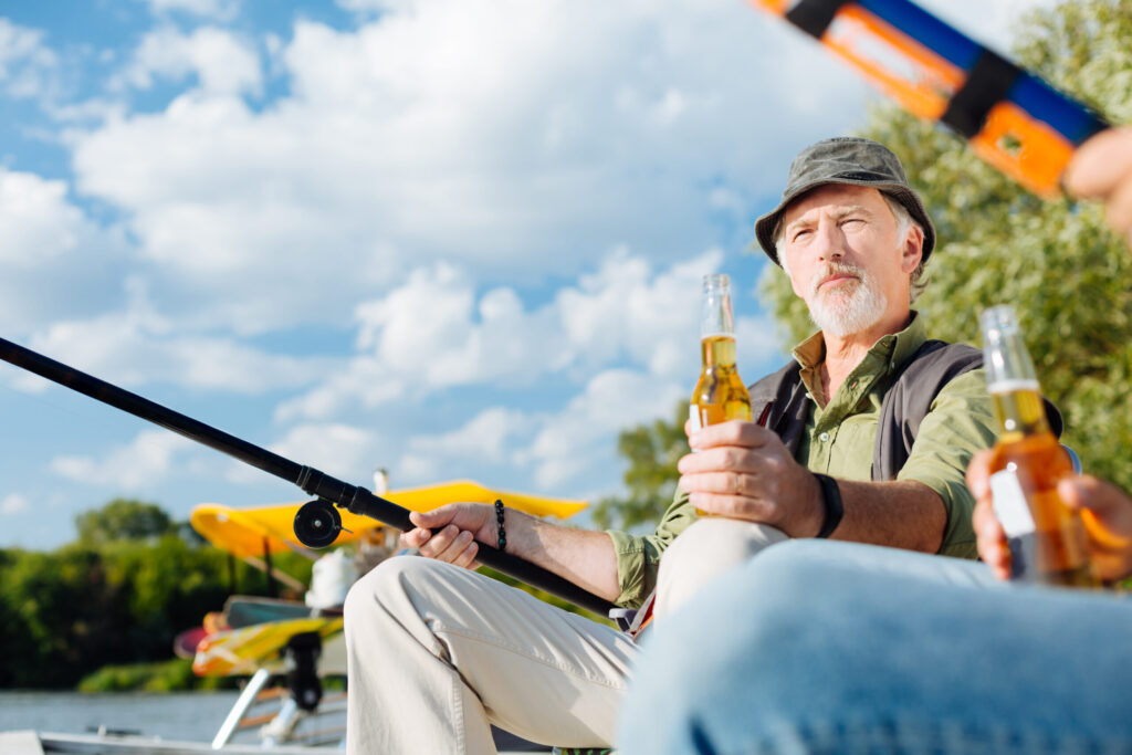 man-having-serious-face-while-fishing-with-male-fr-2022-01-27-22-22-16-utc-scaled